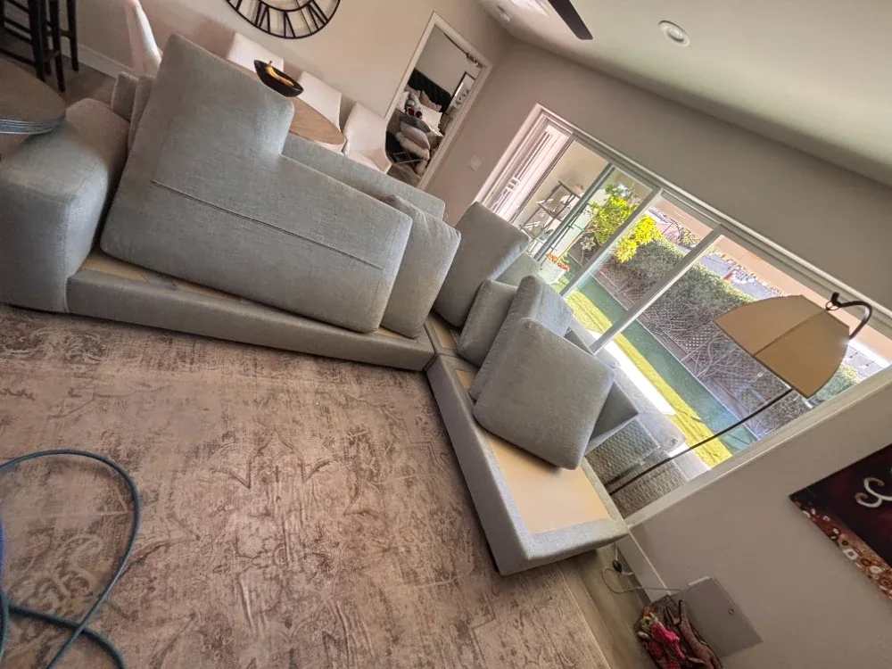 Large fabric sectional in a Gilbert home prepared for cleaning